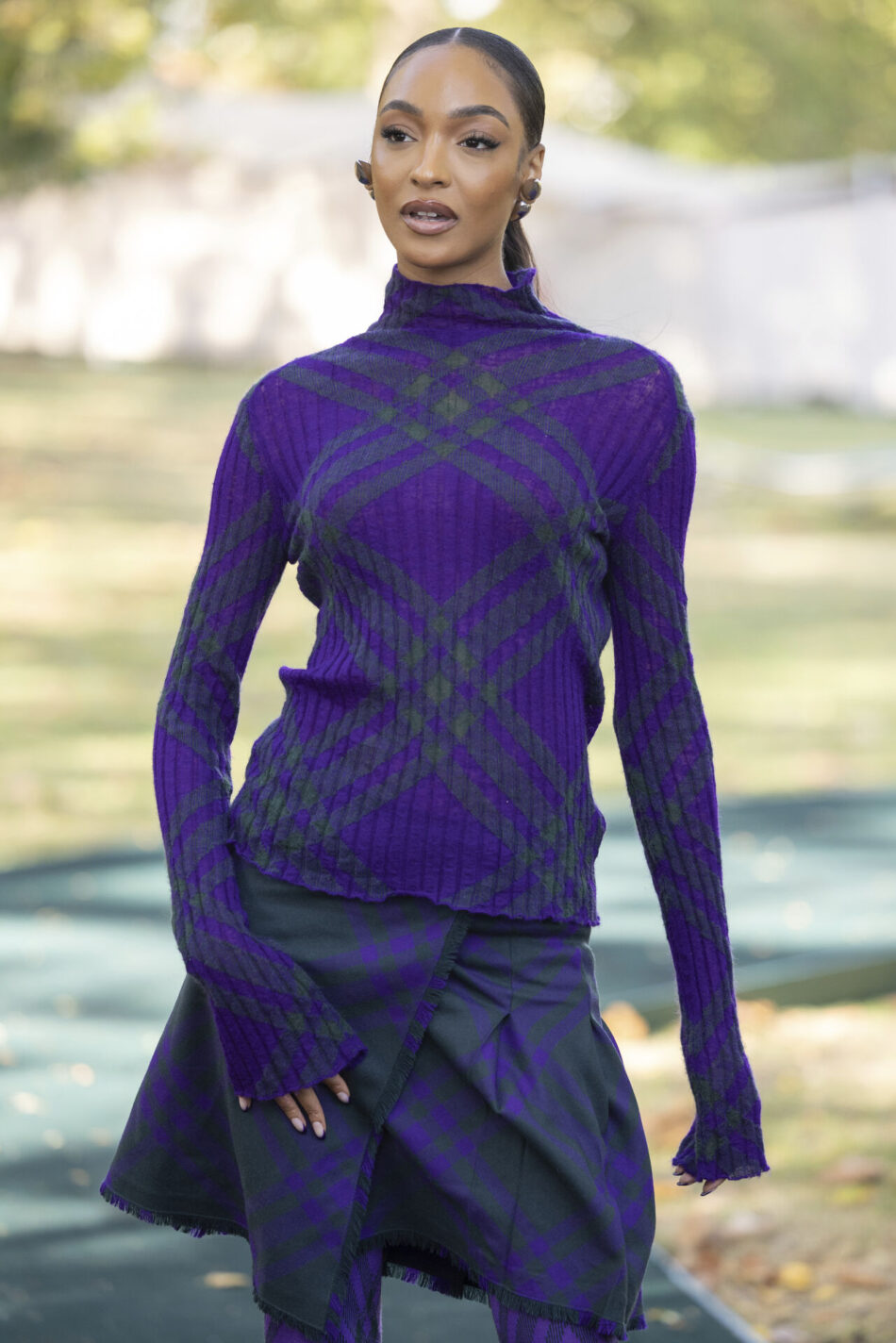 Jourdan Dunn poses for photographers upon arrival at the Burberry Spring Summer 2024 fashion show on Monday, Sept. 18, 2023 in London. (Vianney Le Caer/Invision/AP)