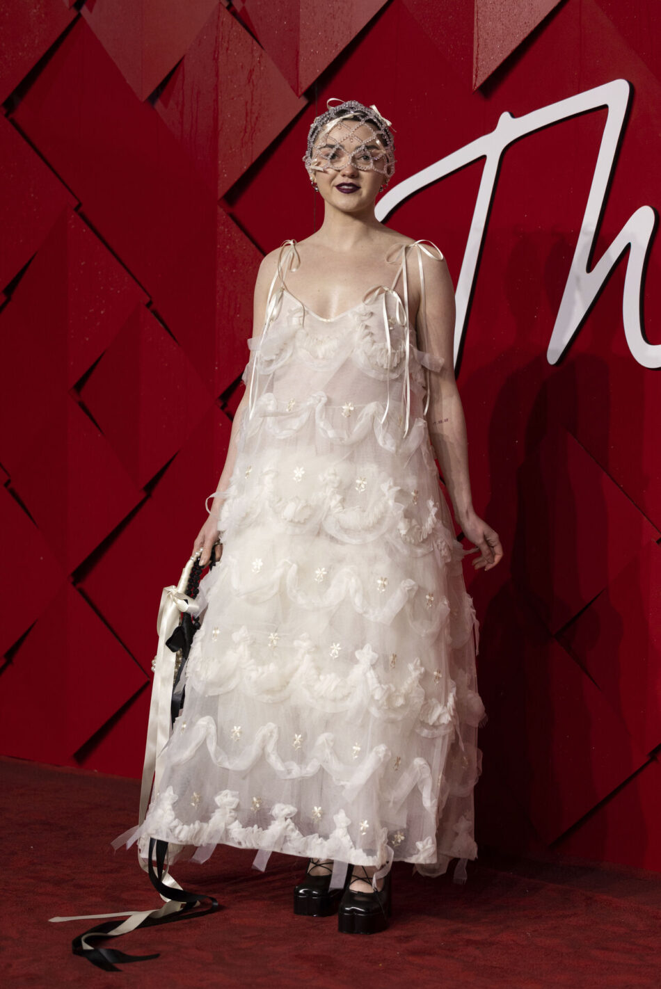 Maisie Williams poses for photographers upon arrival at the British Fashion Awards on Monday, Dec. 4, 2023 in London. (Vianney Le Caer/Invision/AP)