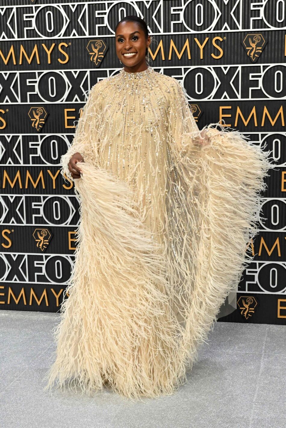 TOPSHOT - US actress Issa Rae arrives for the 75th Emmy Awards at the Peacock Theatre at L.A. Live in Los Angeles on January 15, 2024. (Photo by Robyn BECK / AFP)